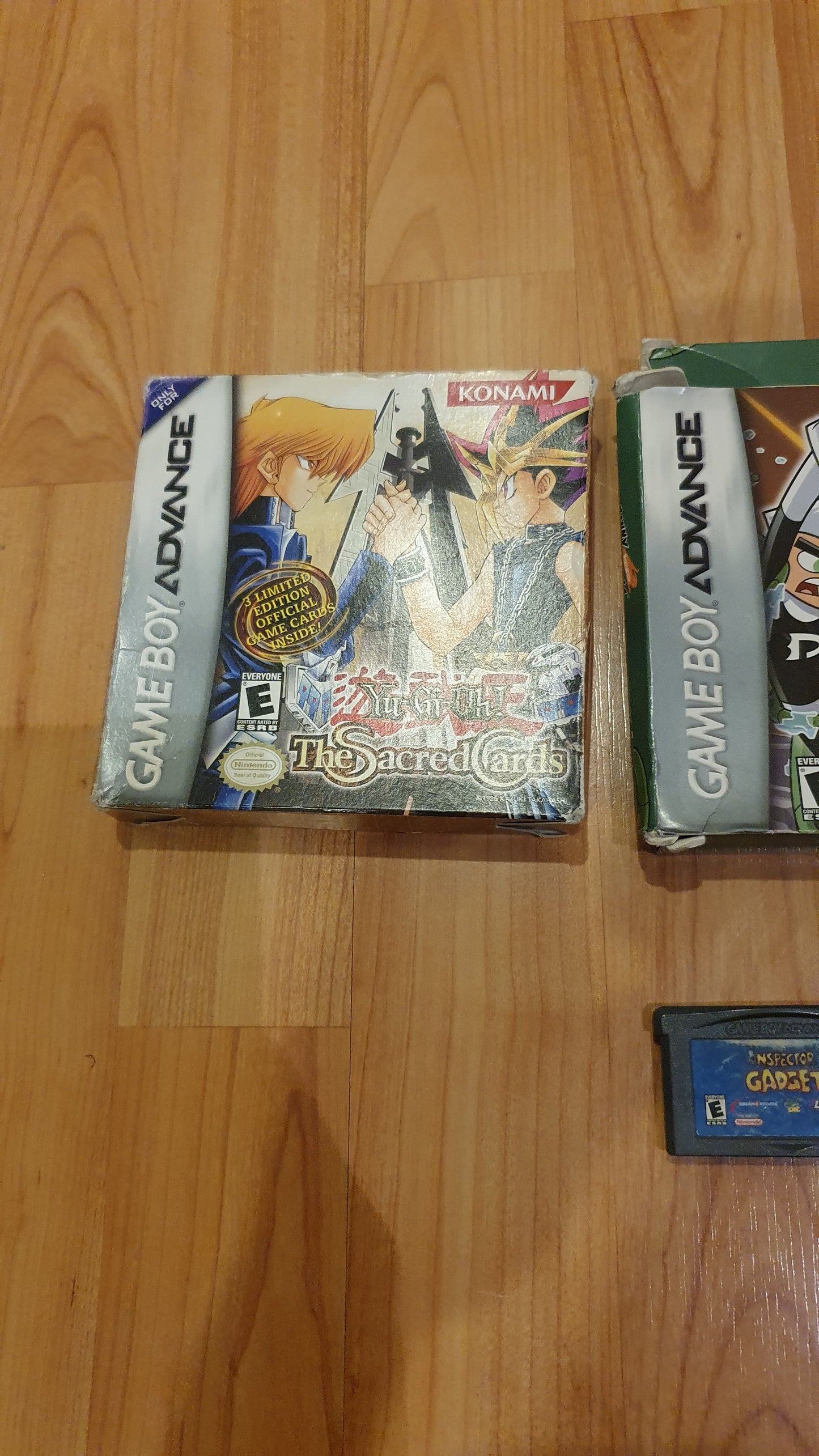 Lot of 5 original Gameboy games in excellent condition: 3 in a box, a Yugioh game in a box, 2 Danny Phantom games in a box, and 2 cartridges (1 Spiderman and Inspector Gadget) - Used.