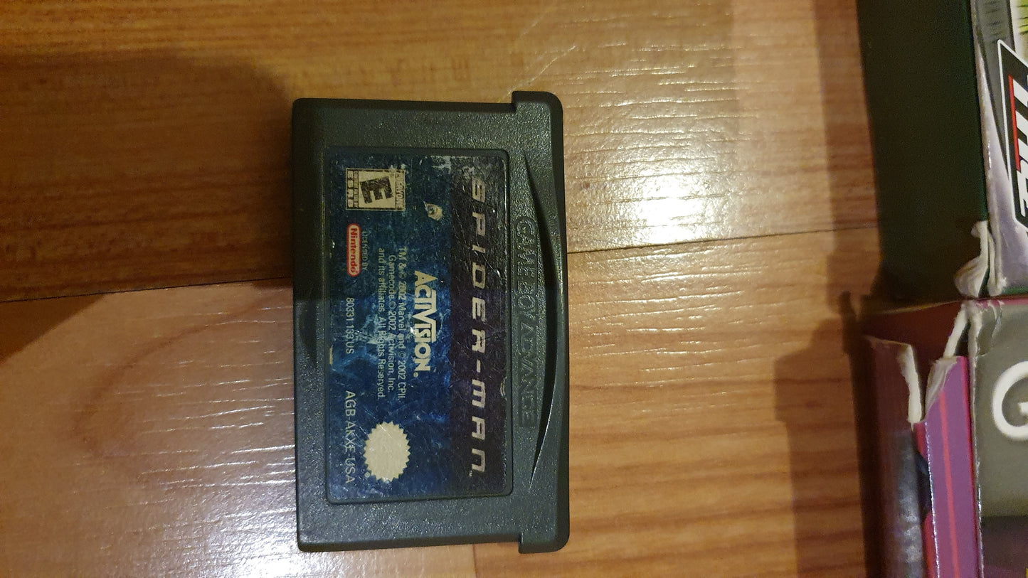Lot of 5 original Gameboy games in excellent condition: 3 in a box, a Yugioh game in a box, 2 Danny Phantom games in a box, and 2 cartridges (1 Spiderman and Inspector Gadget) - Used.