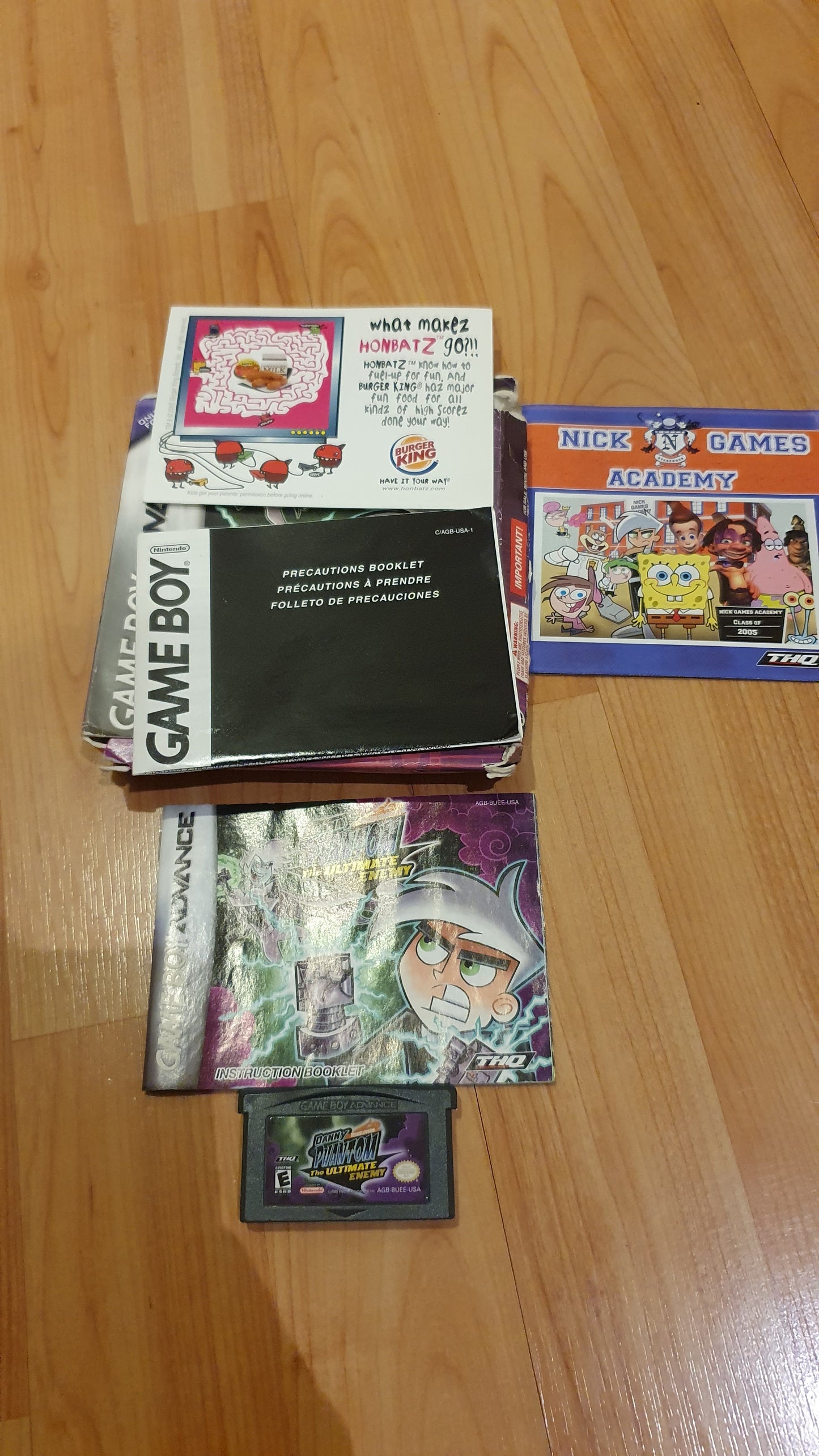 Lot of 5 original Gameboy games in excellent condition: 3 in a box, a Yugioh game in a box, 2 Danny Phantom games in a box, and 2 cartridges (1 Spiderman and Inspector Gadget) - Used.