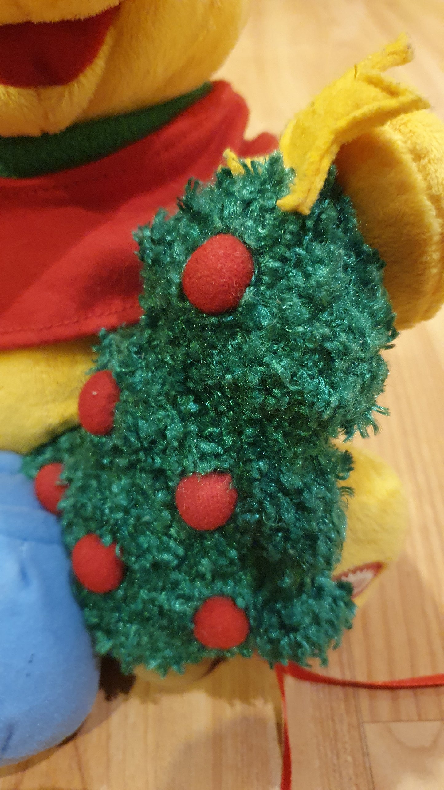 Original Disney Winnie the Pooh Christmas plush with movement and music. Never been used.