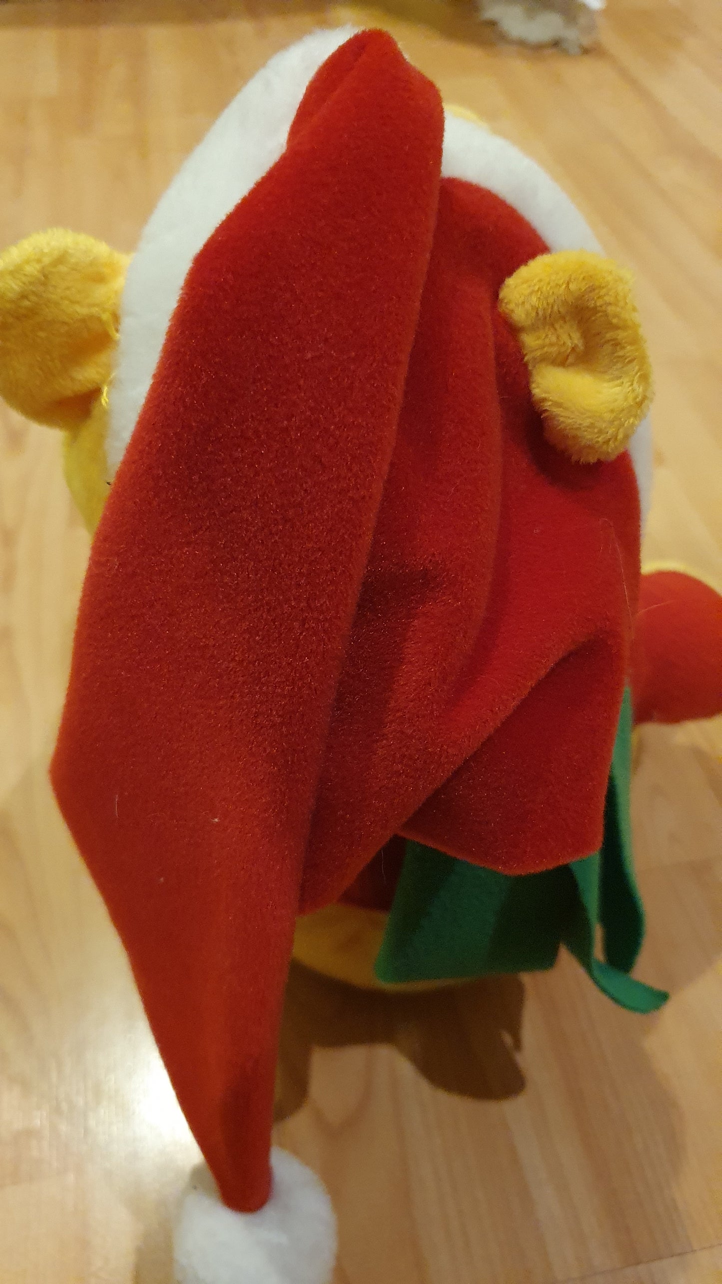 Original Disney Winnie the Pooh Christmas plush with movement and music. Never been used.