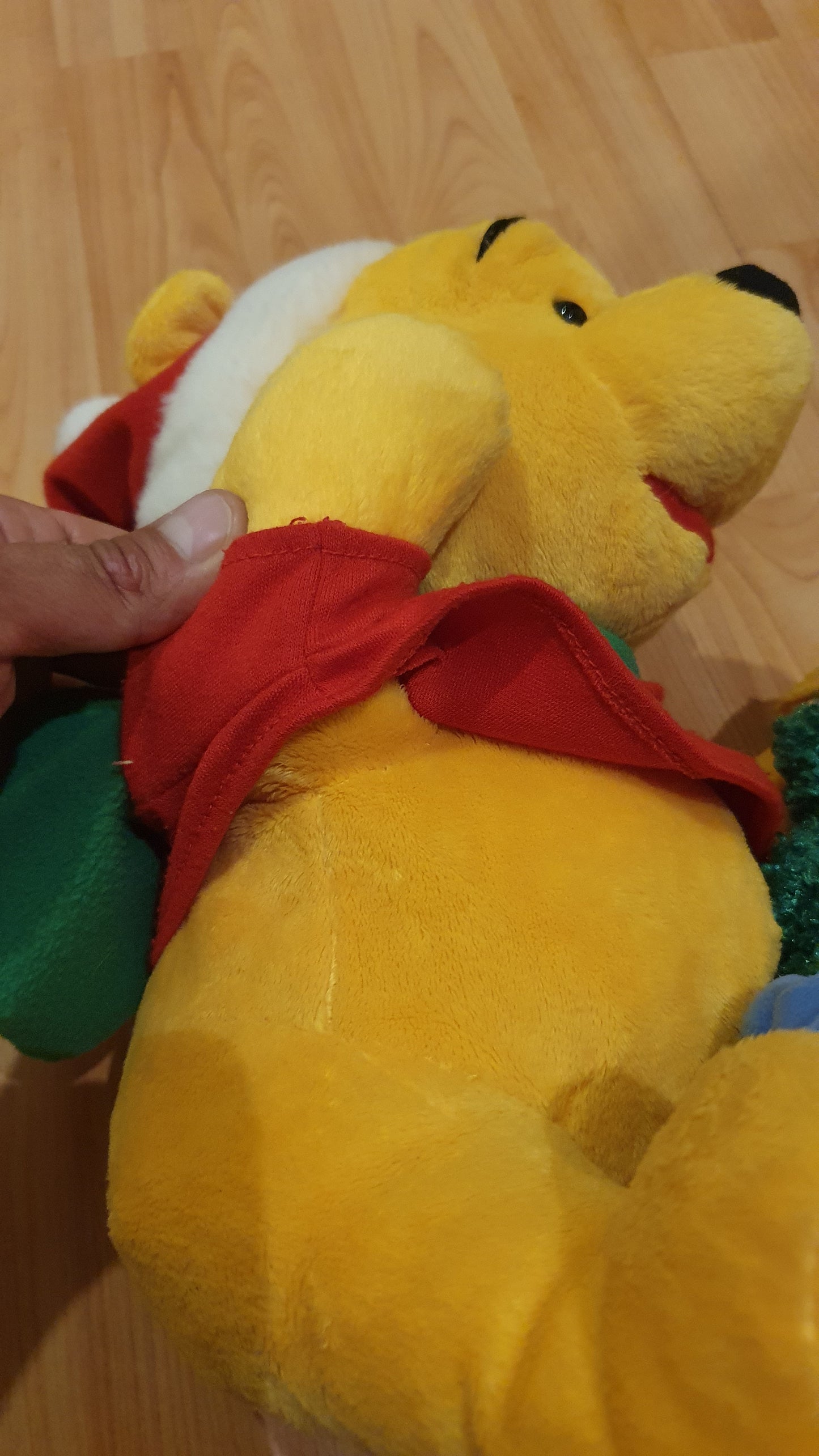 Original Disney Winnie the Pooh Christmas plush with movement and music. Never been used.