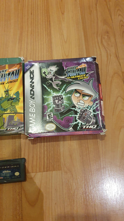 Lot of 5 original Gameboy games in excellent condition: 3 in a box, a Yugioh game in a box, 2 Danny Phantom games in a box, and 2 cartridges (1 Spiderman and Inspector Gadget) - Used.