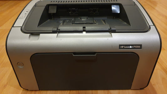 Impresora Láser Monocromática Gris y Negro HP - Usada Vista Principal